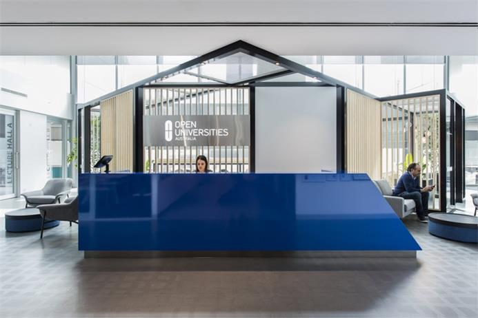 在線教育培訓公司辦公室前臺裝修實景圖